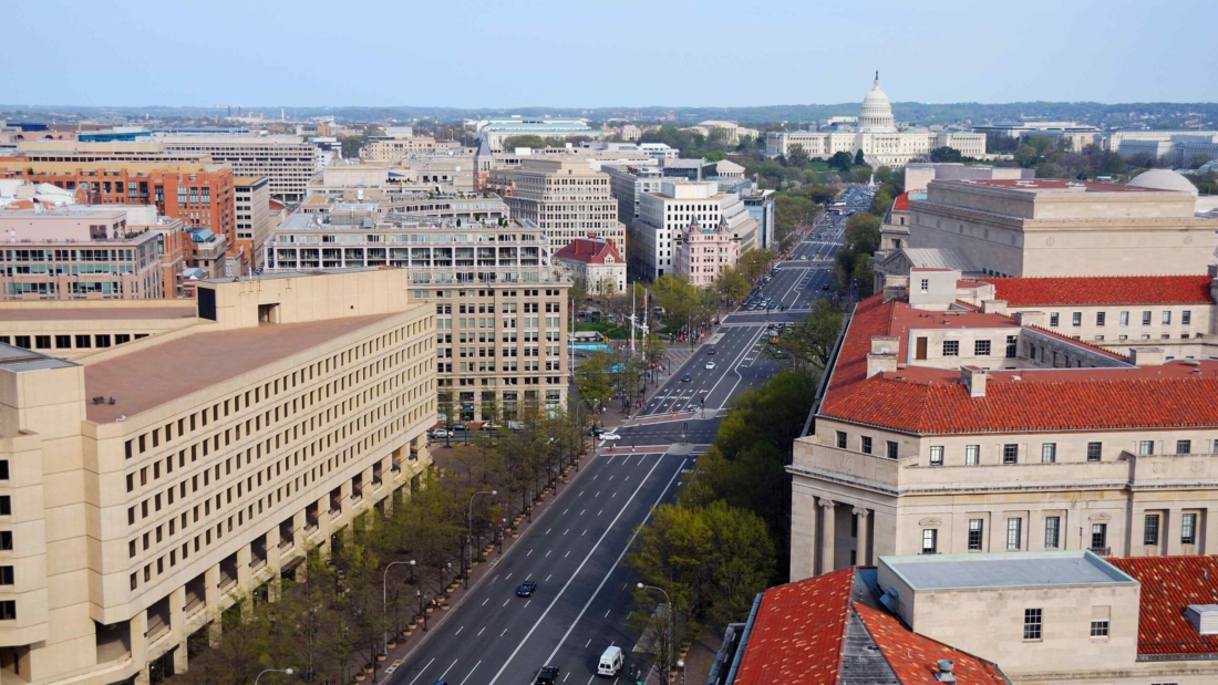 Washington DC skyline with government buildings and capitol hill on Pennsylvania Avenue.